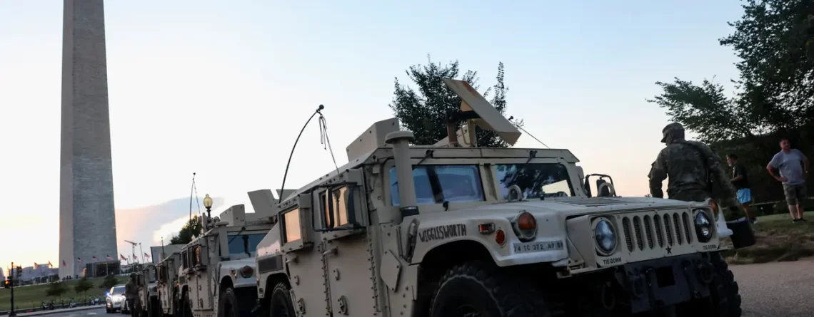 Original Photo from the Guardian US of Armoured Vehicles parked under George Washington’s Memorial. August 17, 2025