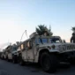 Original Photo from the Guardian US of Armoured Vehicles parked under George Washington’s Memorial. August 17, 2025
